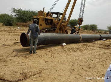 Sailor Infra crew laying pipeline with sideboom equipment